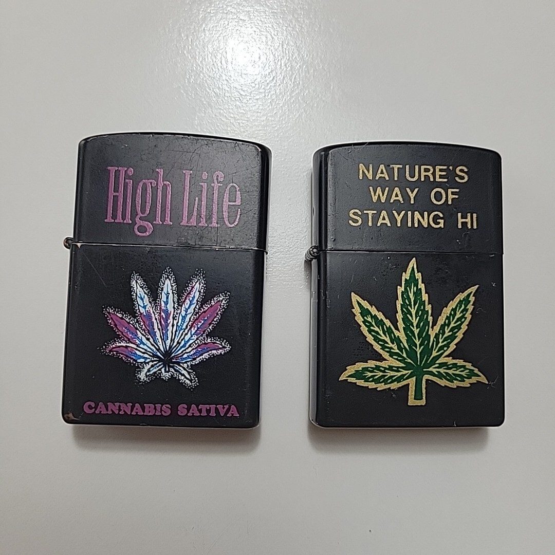 Windproof Lighters Cannabis Logos Roman Lighters Used OK Condition Lot Of 2