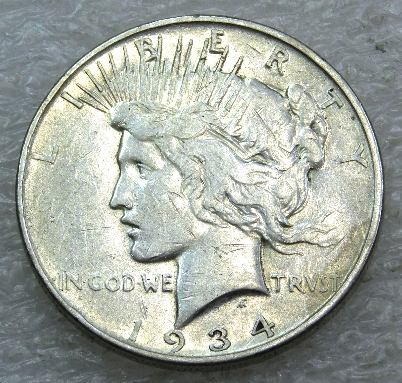 1934-D Peace Silver Dollar with Luster in saflip #S311