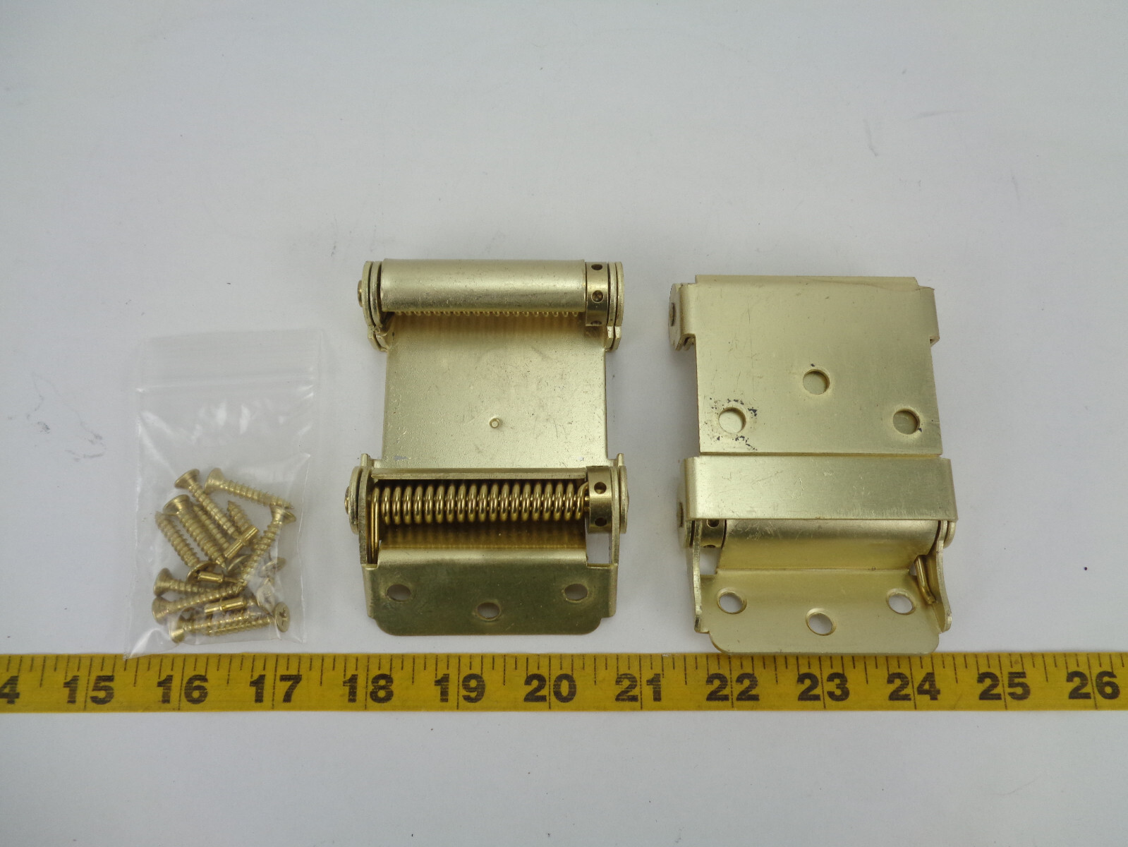 Pair of National Hardware N115-303 Spring Hinges 3-Inch Brass with Hardware