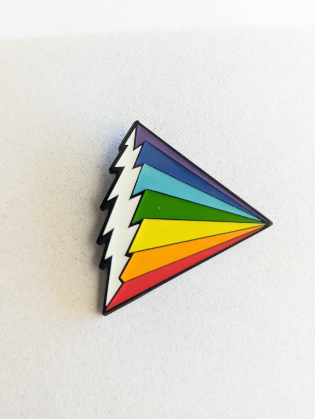 Glow In The Dark Grateful Dead 13pt Bolt Prism Pin.