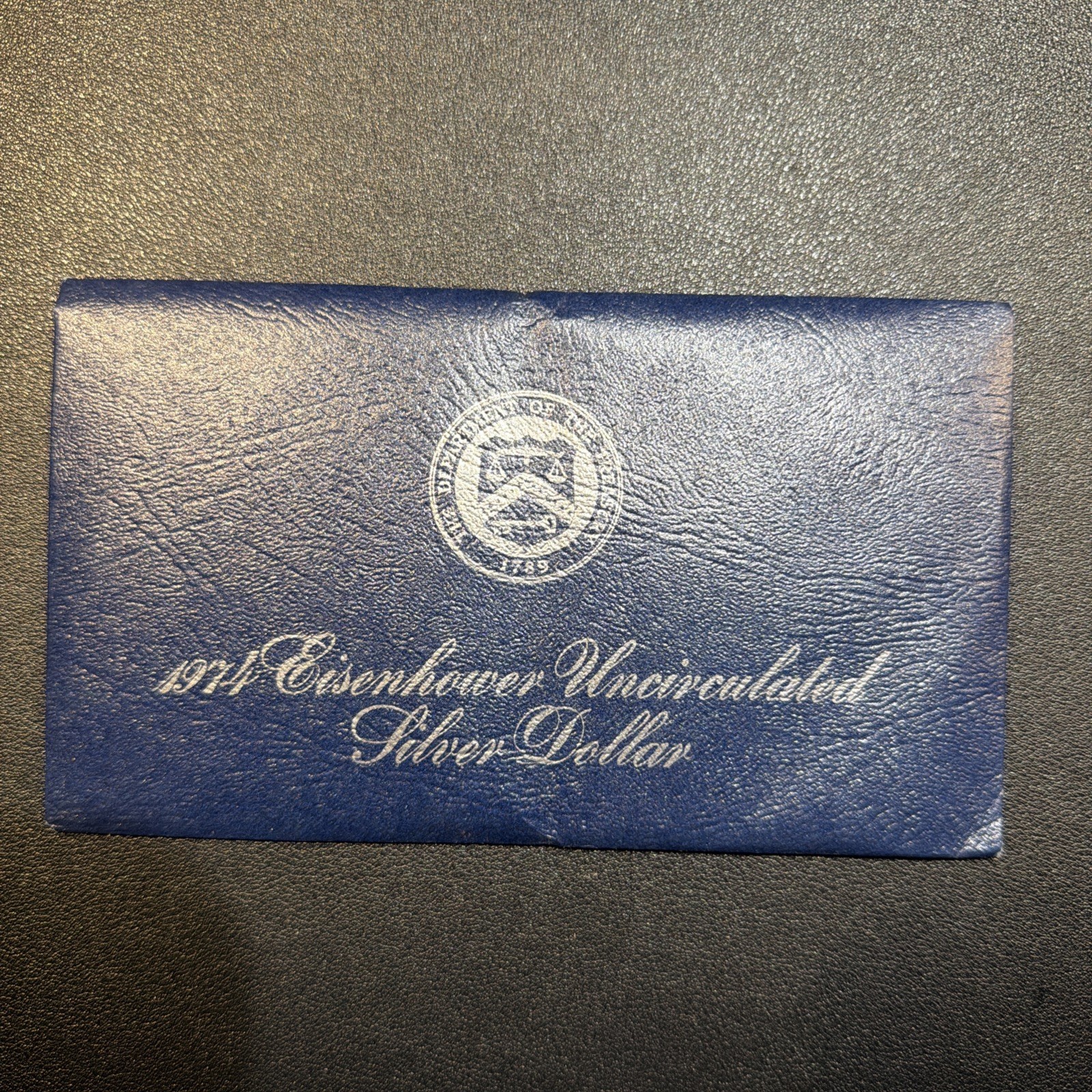 1974 Uncirculated Silver Eisenhower Dollar in Blue envelope Gorgeous!