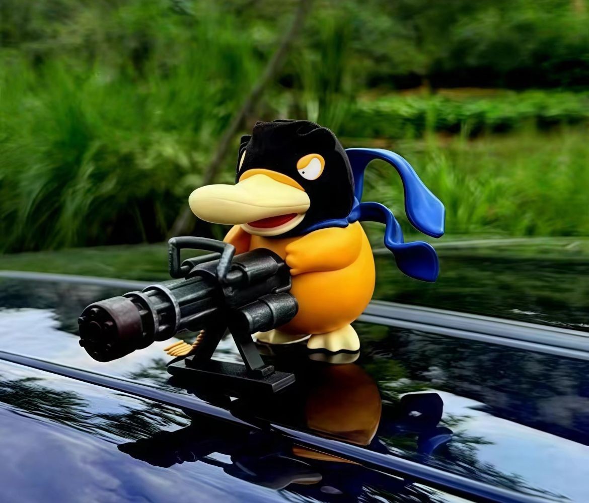 Pokemon Psyduck Gatling Gun Action Figure Military Duck Collectible Toy 9cm
