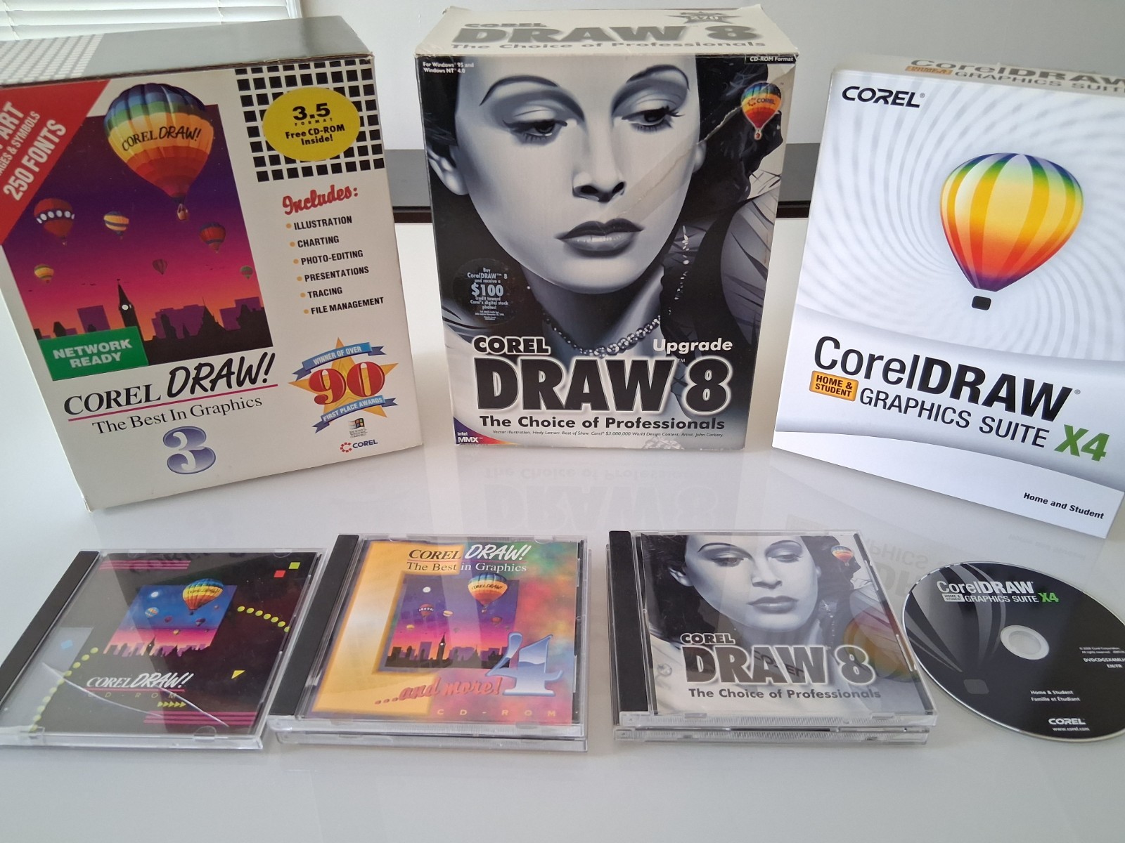 Vintage CorelDRAW 3, 4, 8, x4 software suites with all docs and serial numbers