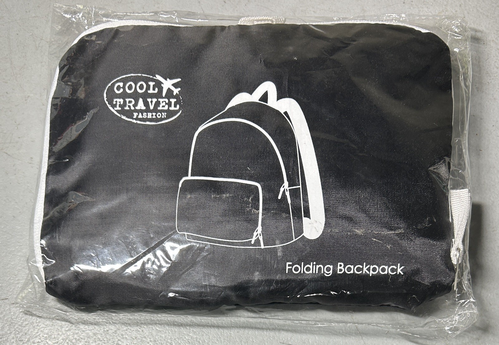 Macys Cool Travel Fashion Folding Backpack Efficient Space Saver Blk/Wht New  ￼