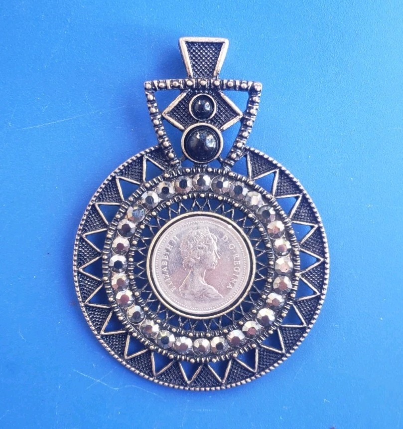 Vintage Canada Dollar Coin Pendant with Gold Tone Bezel