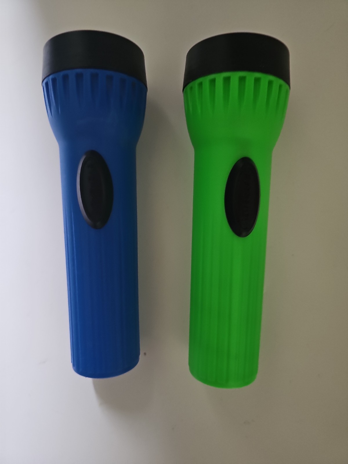 Eveready Plastic Flashlight Regular Light Uses 2D Battery 2 Count Green Blue