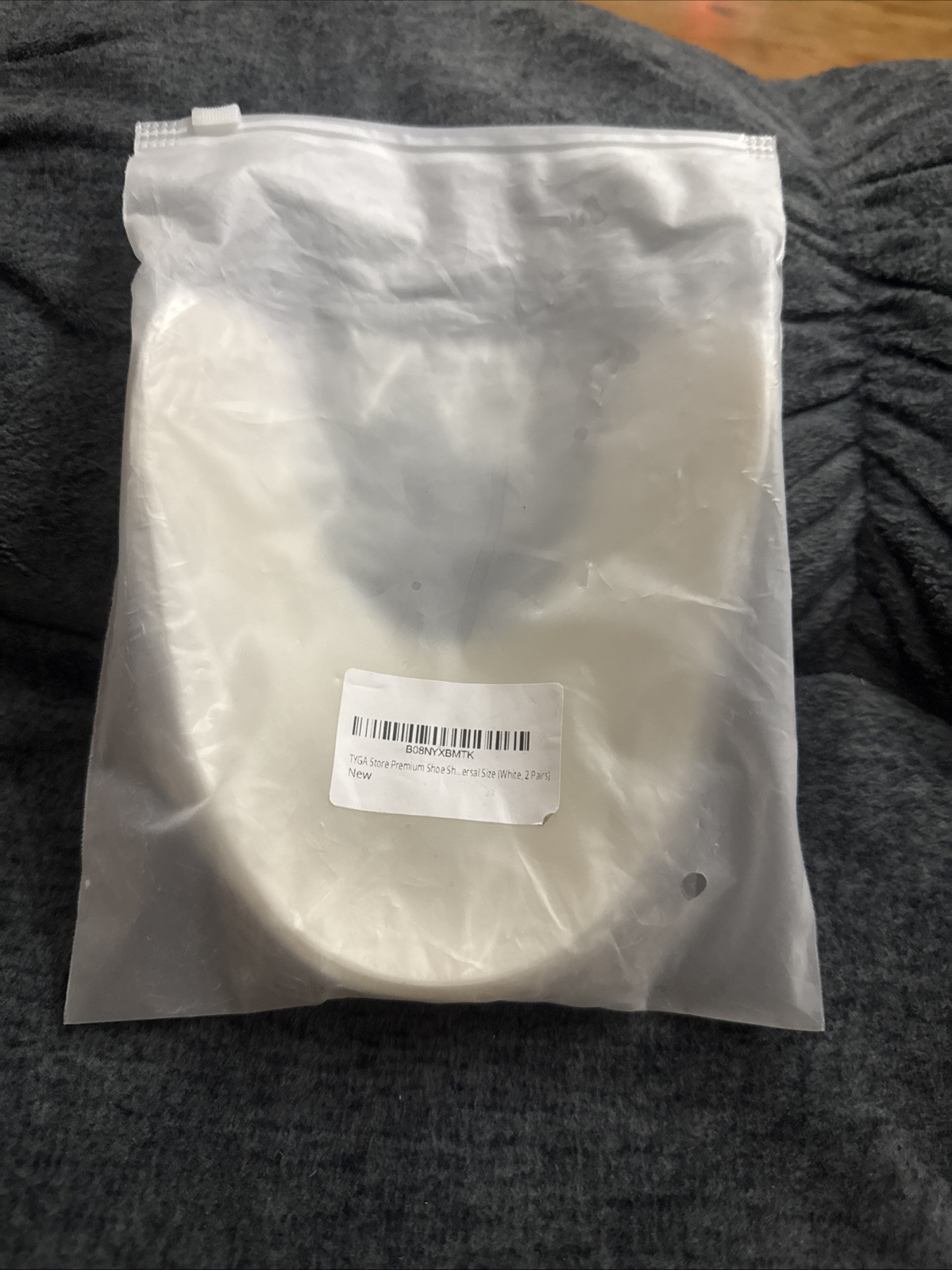 Anti-crease inserts on sneakers