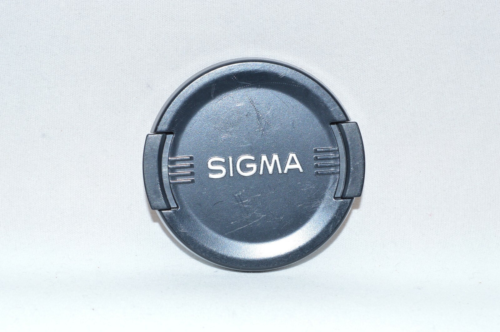 Sigma 55 mm Hard Plastic Tab-Lock Front Lens Made in Japan. (FLC-158)