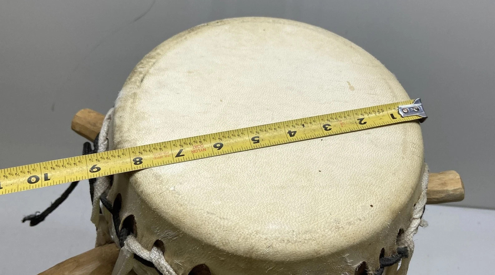 Wood and animal hide drum