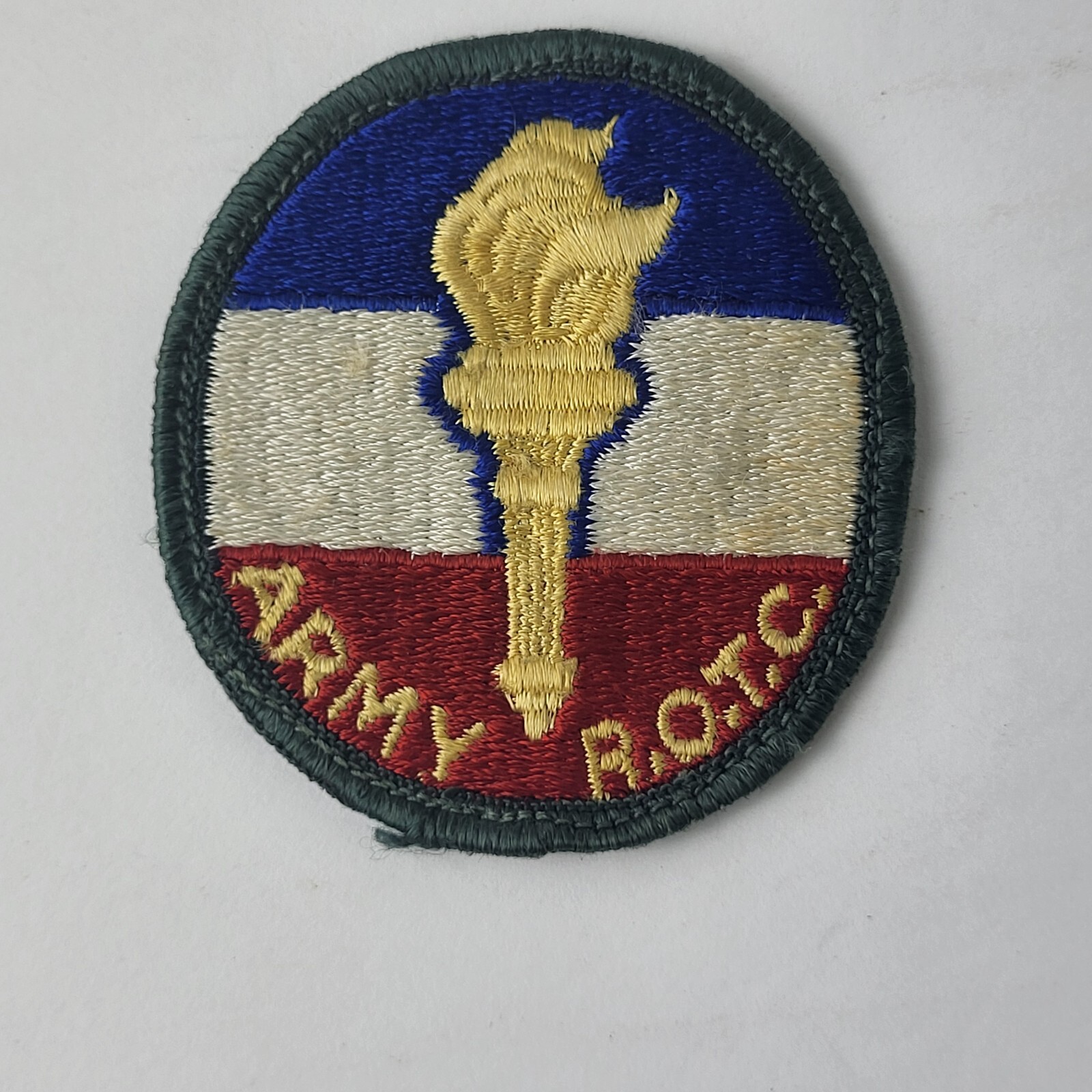 Army ROTC Military Patch Golden Torch Red White Blue Green Border