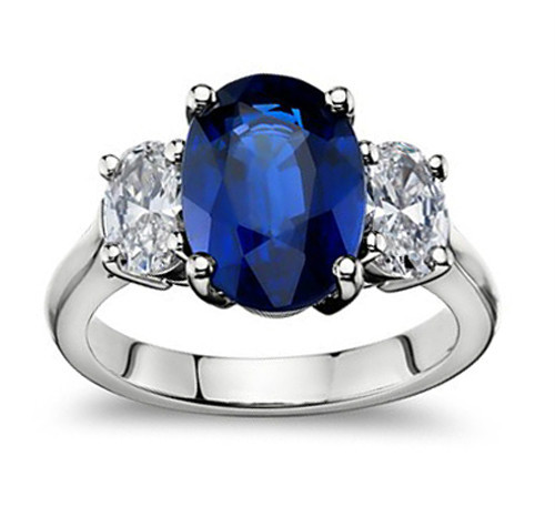 9.45 ct Oval Shape Sapphire With Oval Shape Diamond Anniversary Ring 14 kt Gold