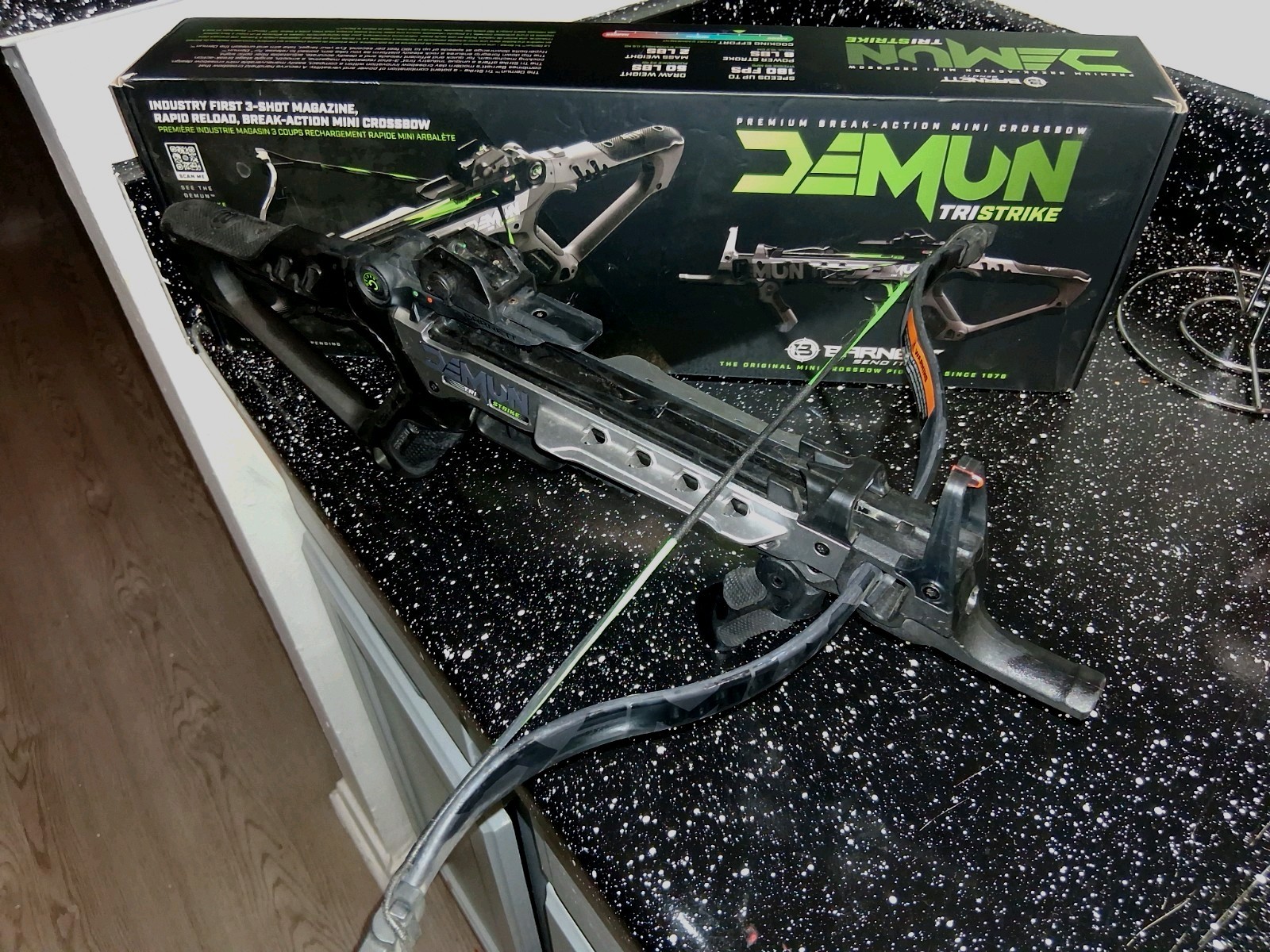 Black crossbow with green