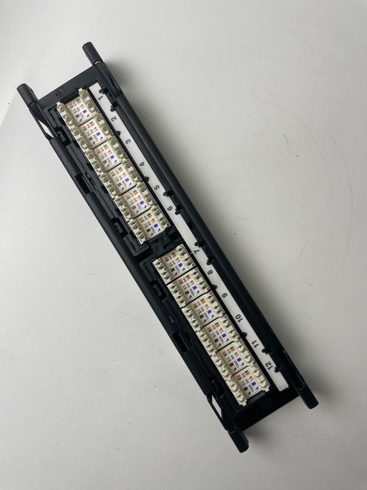 Panduit DP6 Plus DP12688TGY 12-port category 6 punchdown flat patch panel, Black