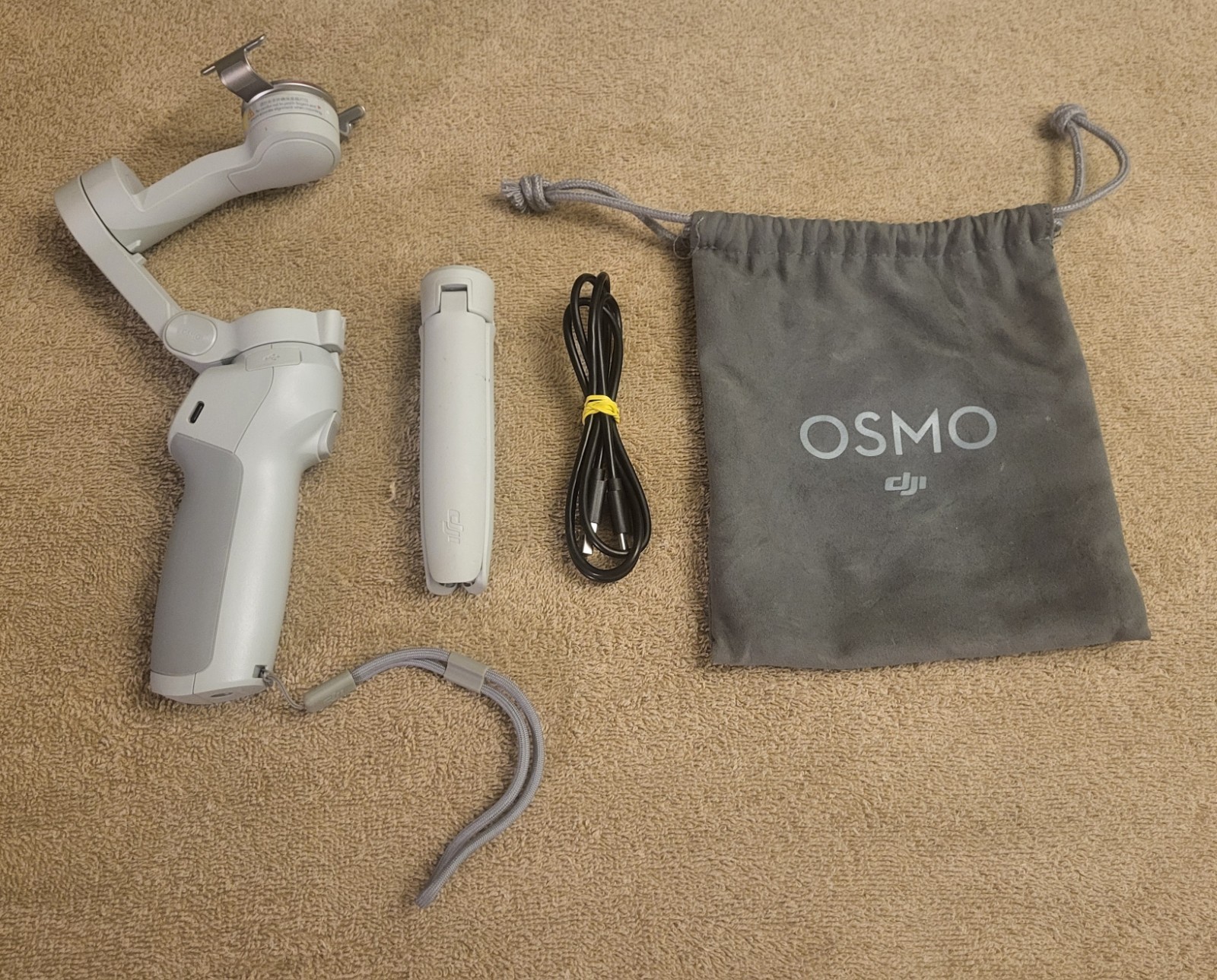 DJI OM 4 - Handheld 3-Axis Smartphone Gimbal Stabilizer with Grip Tripod - Read