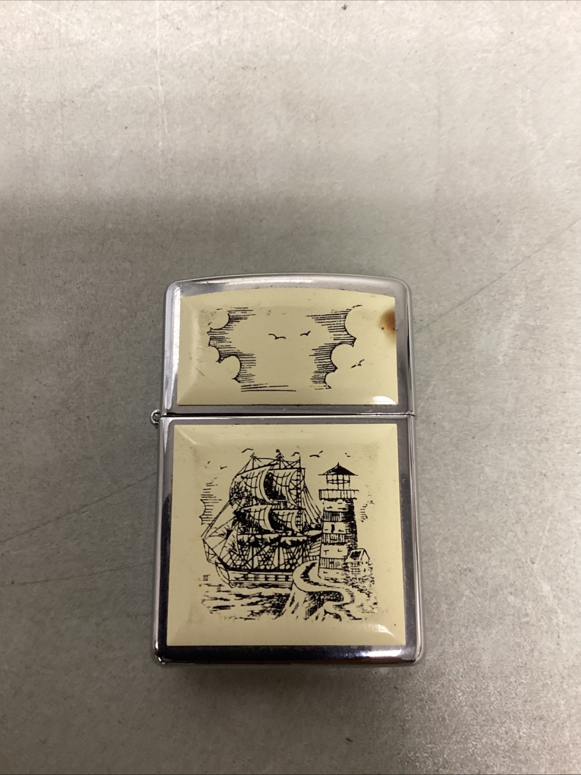 Zippo lighter, 1993 model, sailing ship and lighthouse design
