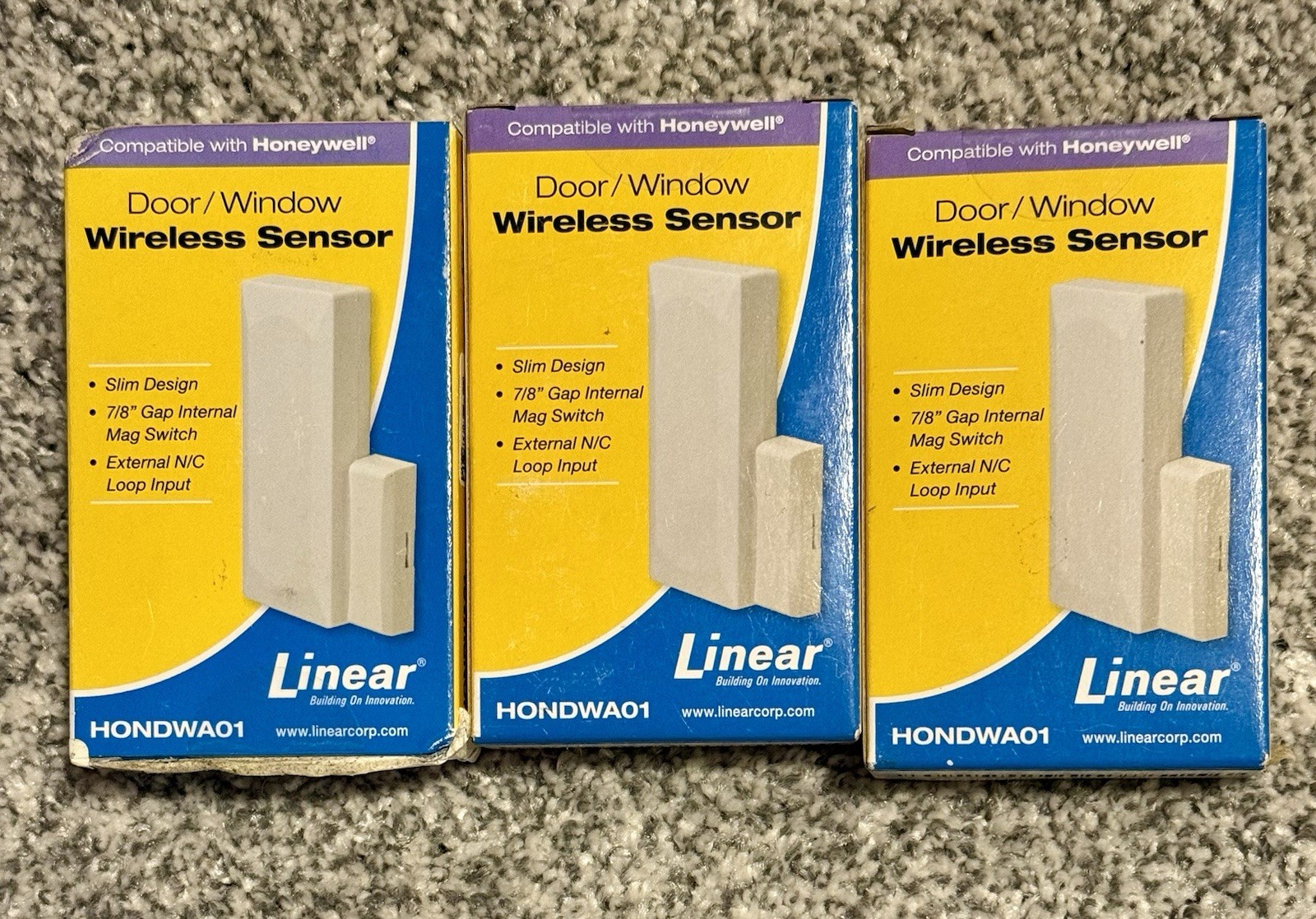 NIB (3) Linear HONDWA01 Wireless Door/Wind Sensors - Honeywell Compatible Brown