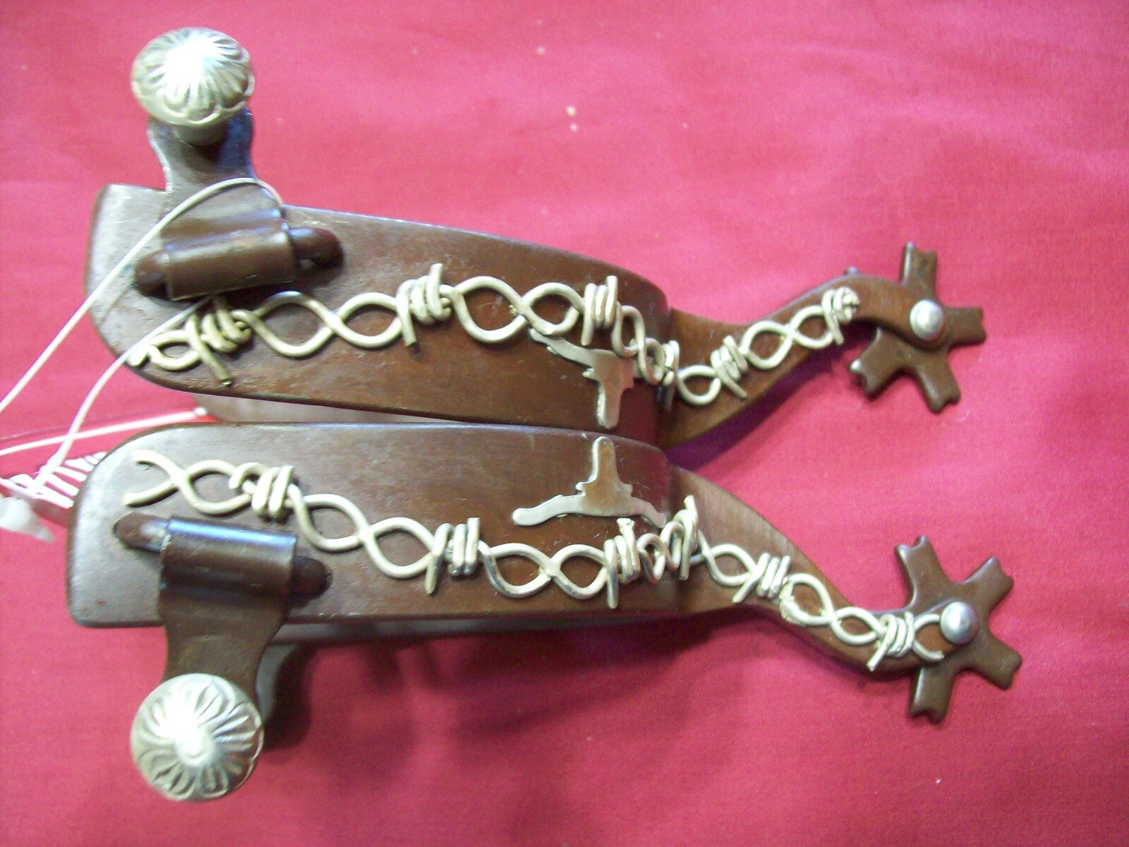 Showman® brown steel spur silver barb wire design steer head