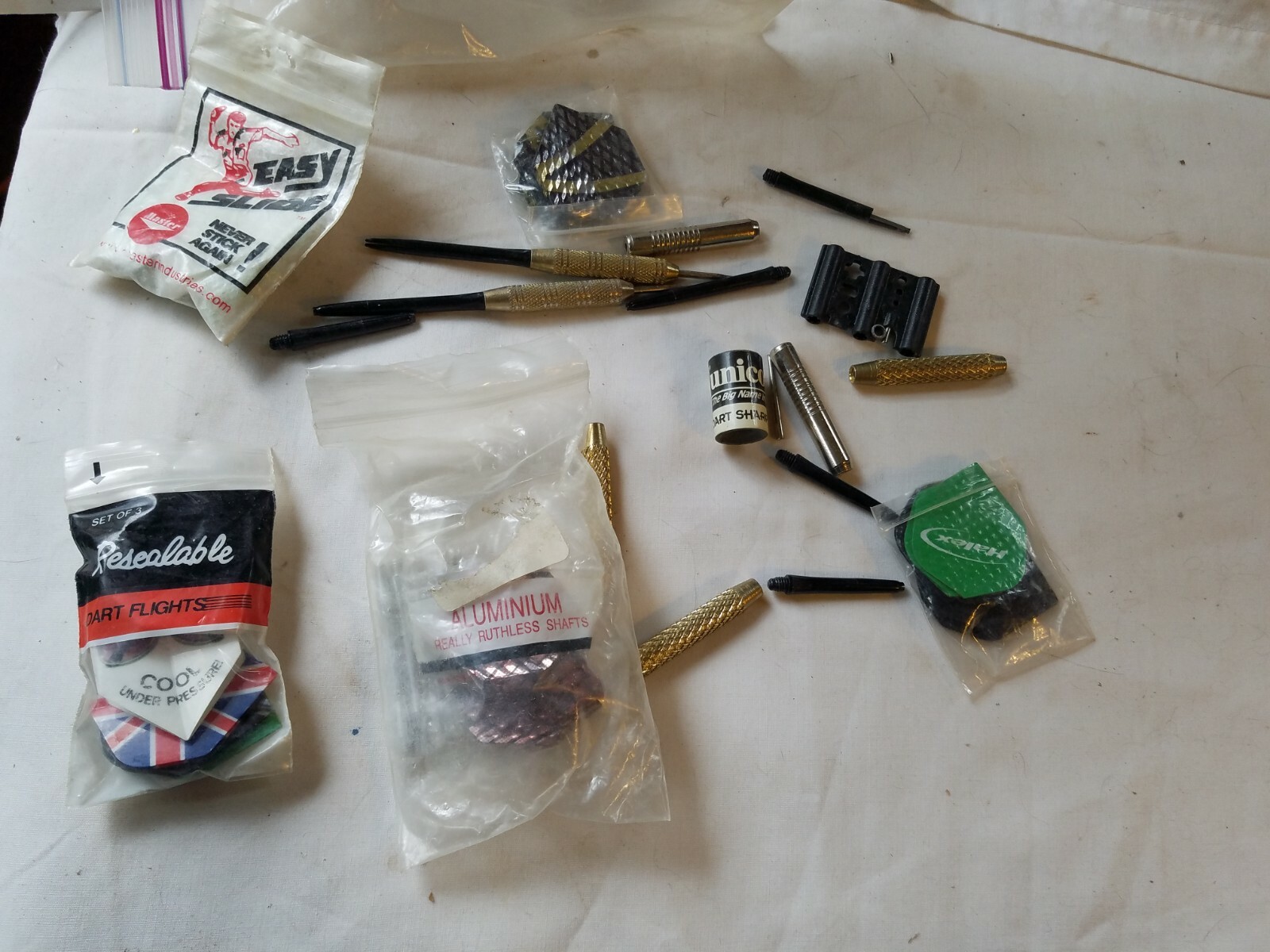 Assorted Lot of Dart Shafts / Flights Accessories & A Sharpener