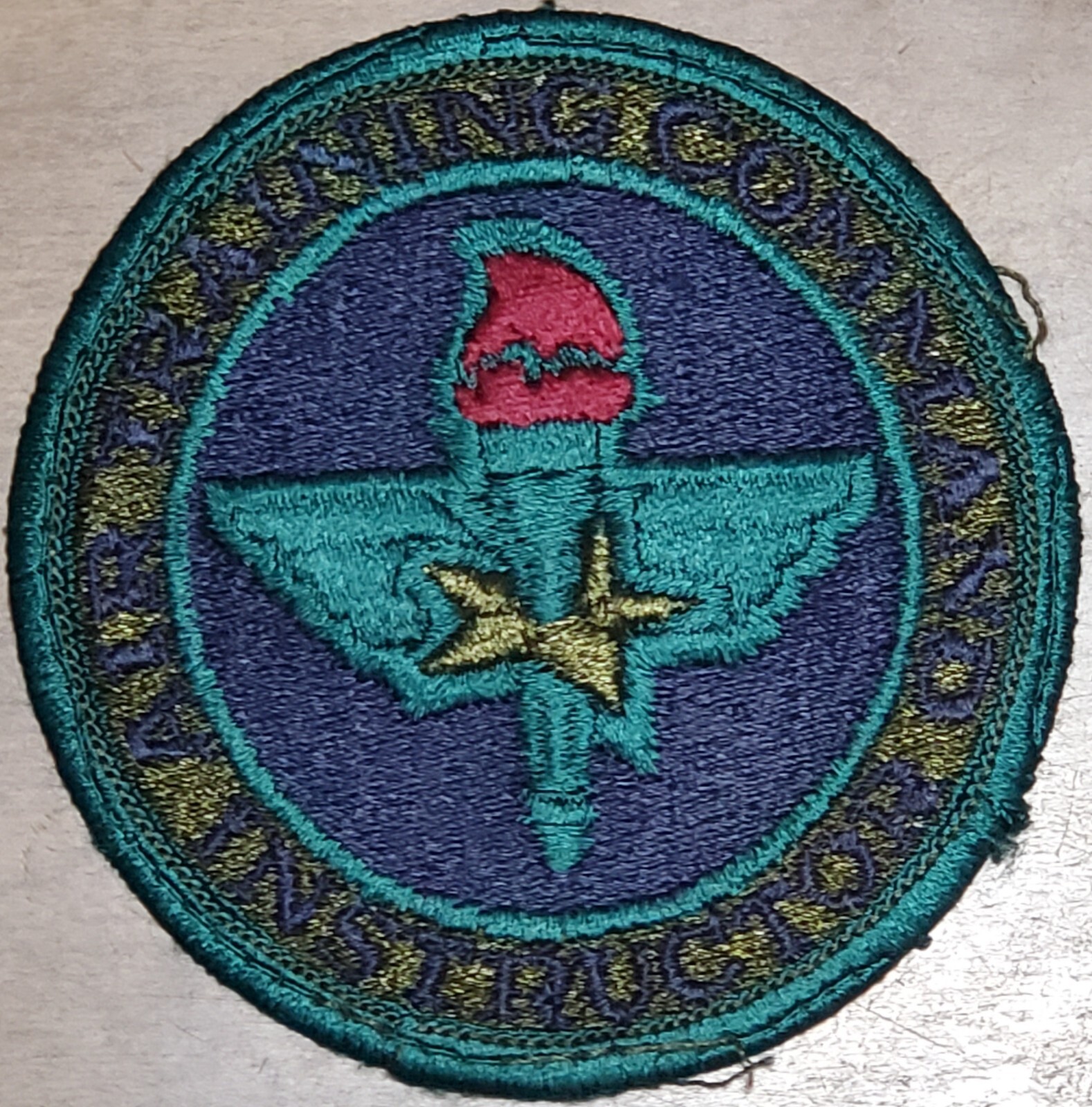 USAF AIR FORCE: AIR EDUCATION AND TRAINING COMMAND INSTRUCTOR PATCH SUBDUED VTG