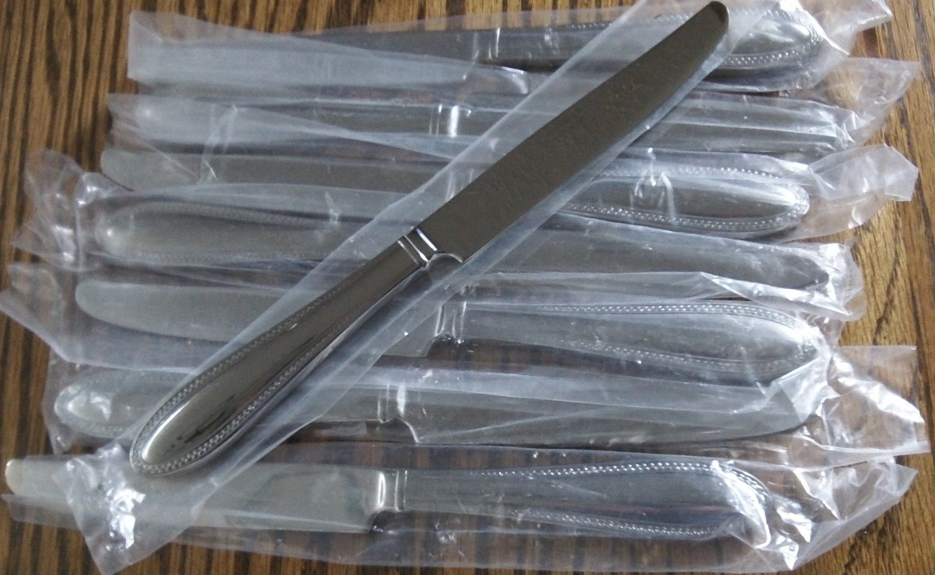 REED & BARTON LAUREL set/8 Place Knives, new in wrappers.  BEAUTIFUL!         G5