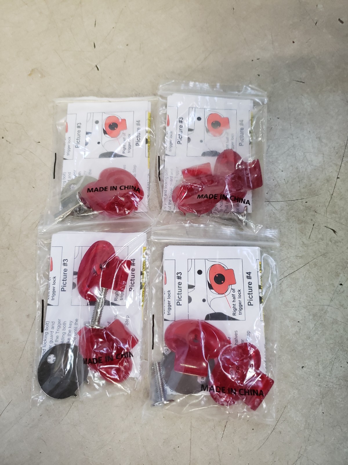 Lot of 4 - Regal Industrial Sales Polymer Clamshell Trigger Locks, Red, RTL3890