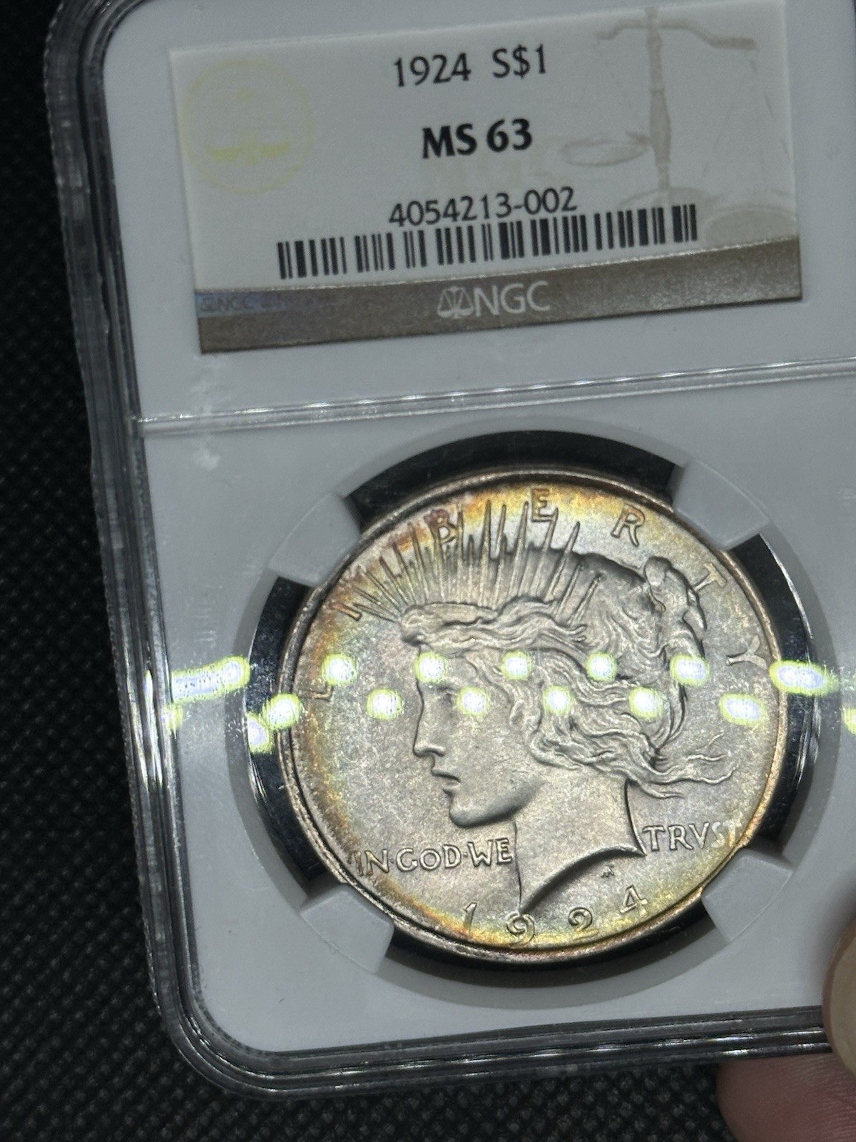 1924 Peace Silver Dollar NGC MS-63 Rainbow Toning