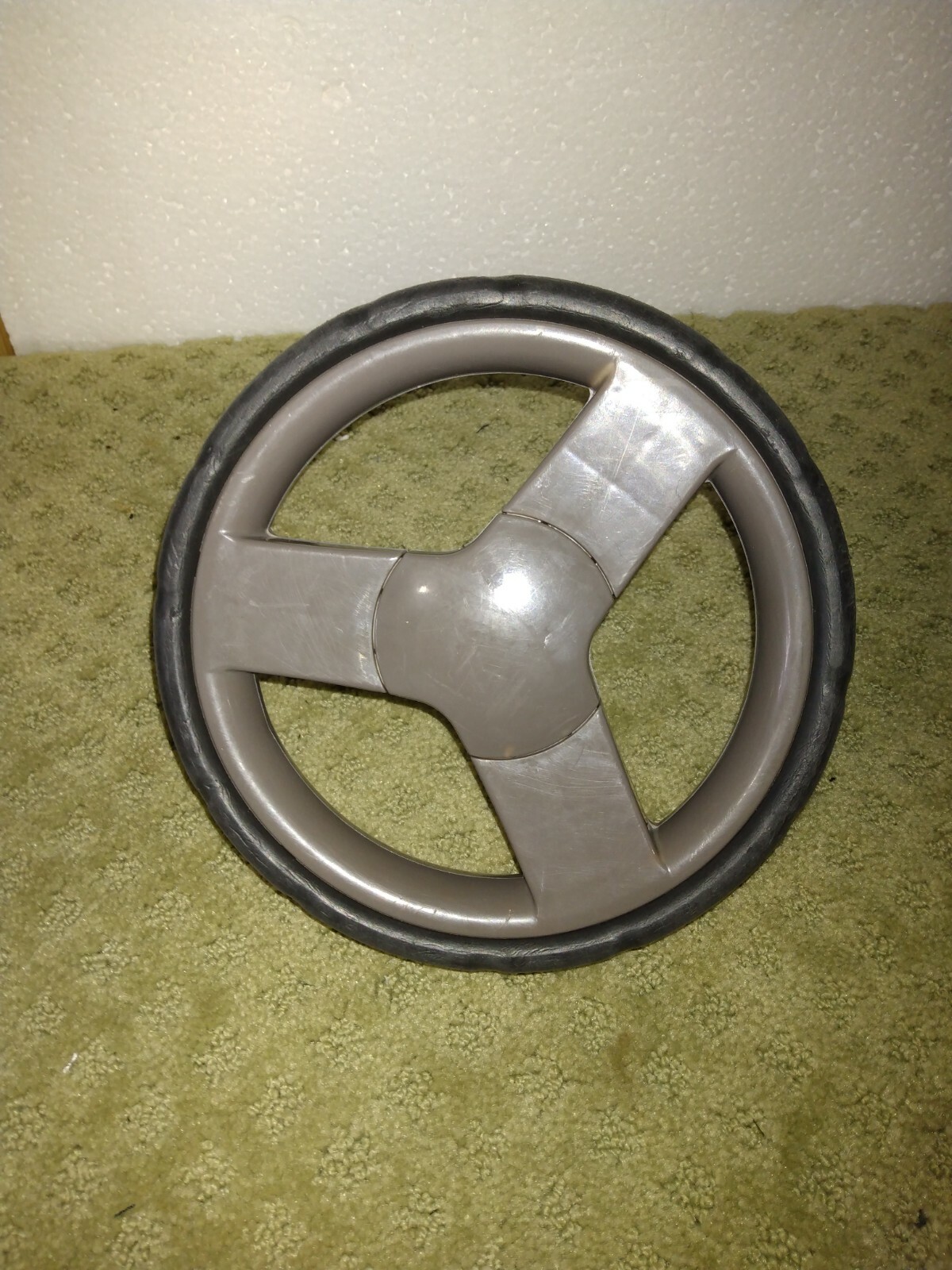 Evenflo Stroller rear wheel only. Size 7 3/4"