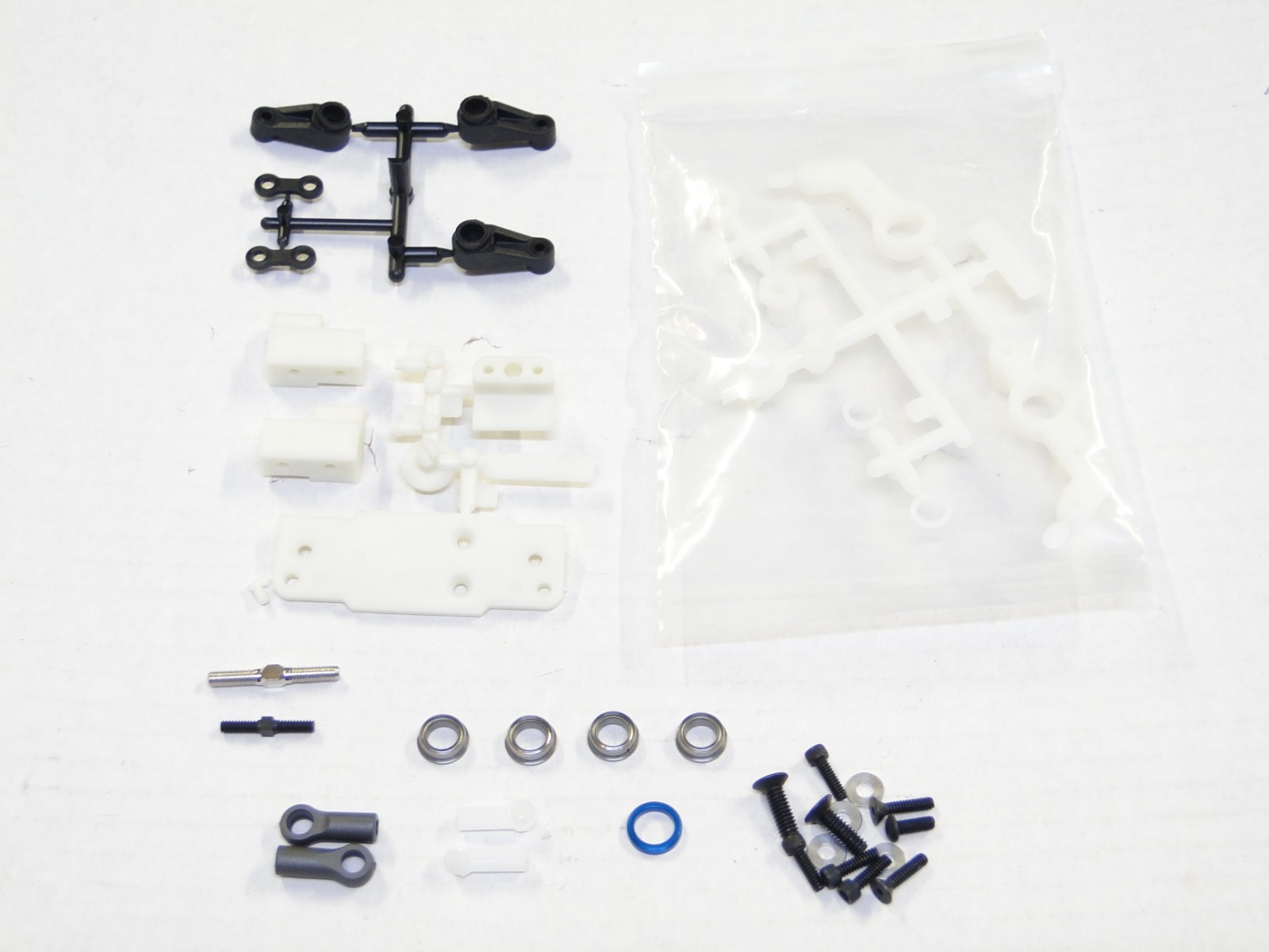 NEW ASSOCIATED RC10 4WD TEAM CAR Steering Bellcrank & Servo Mount AH24