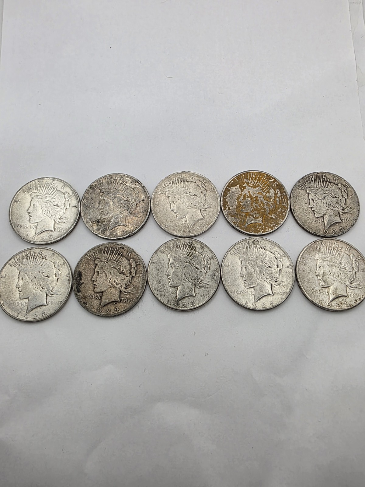 Lot Of 10 Assorted Peace Silver Dollars