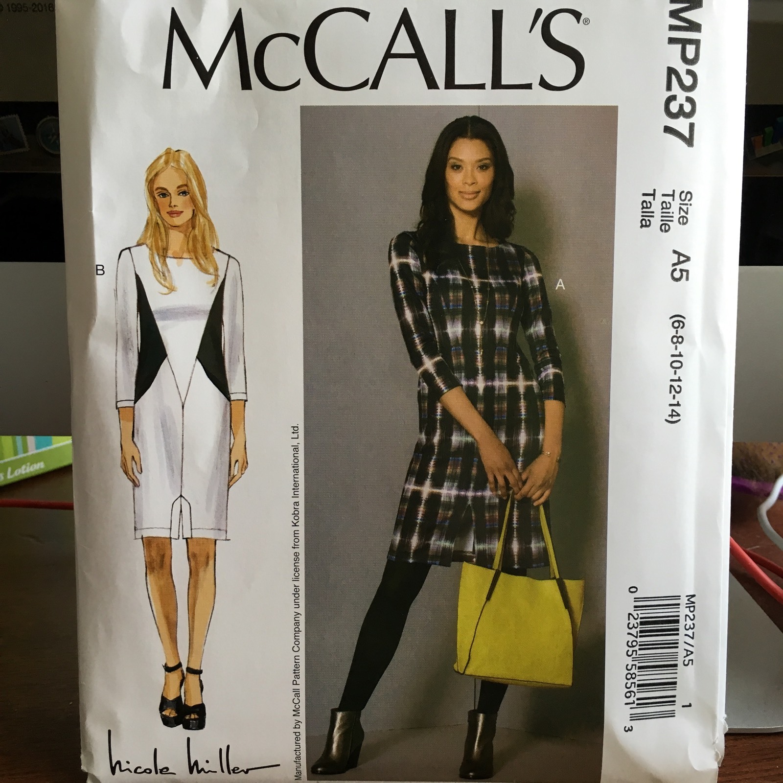 McCalls pattern MP237 Nicole Miller seamed dress with front hem slit size 6-14