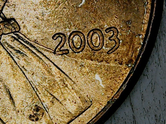 2003 Lincoln Cent , large die breaks.