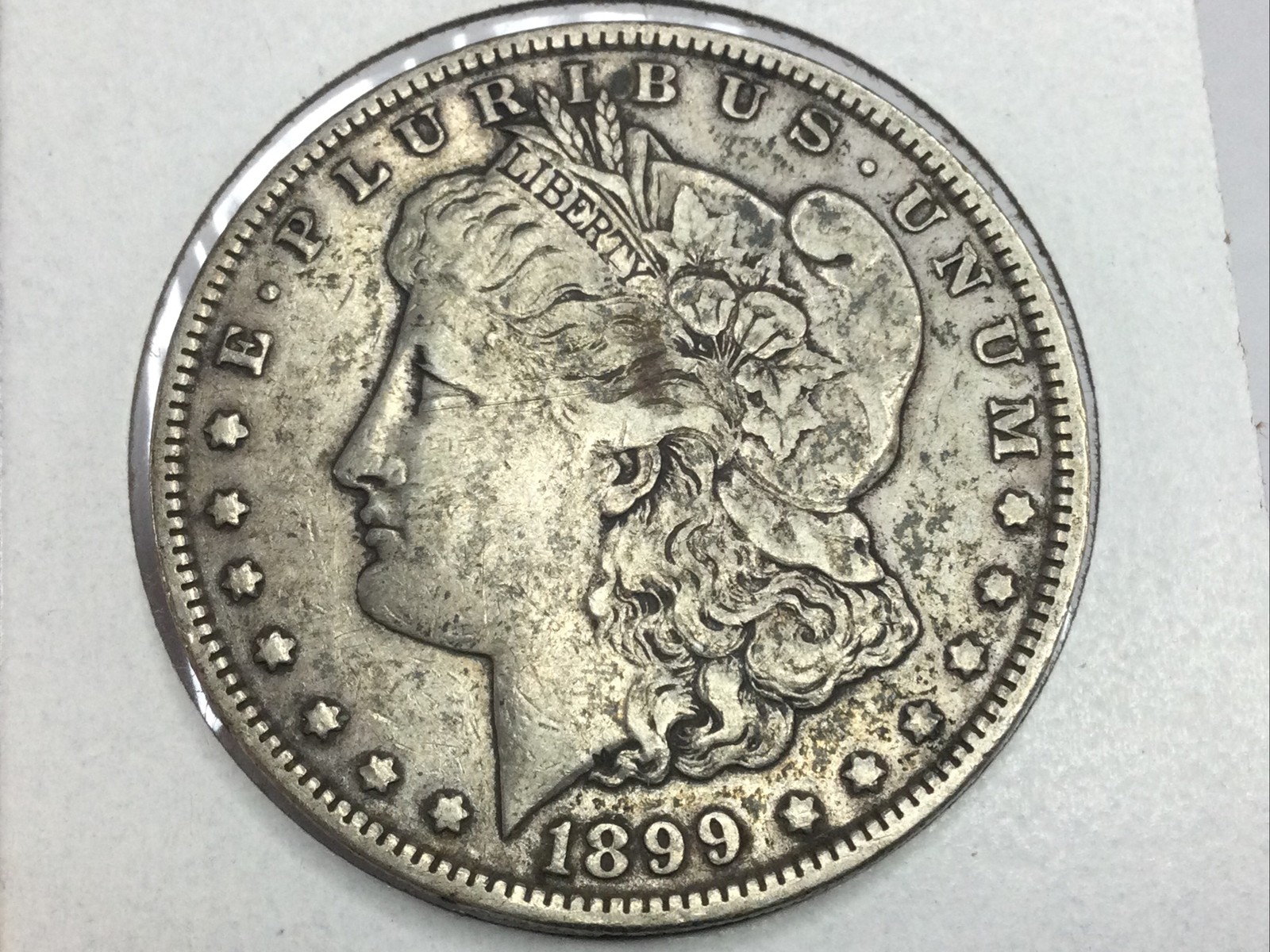 1899-O micro O Morgan Dollar in extra fine
