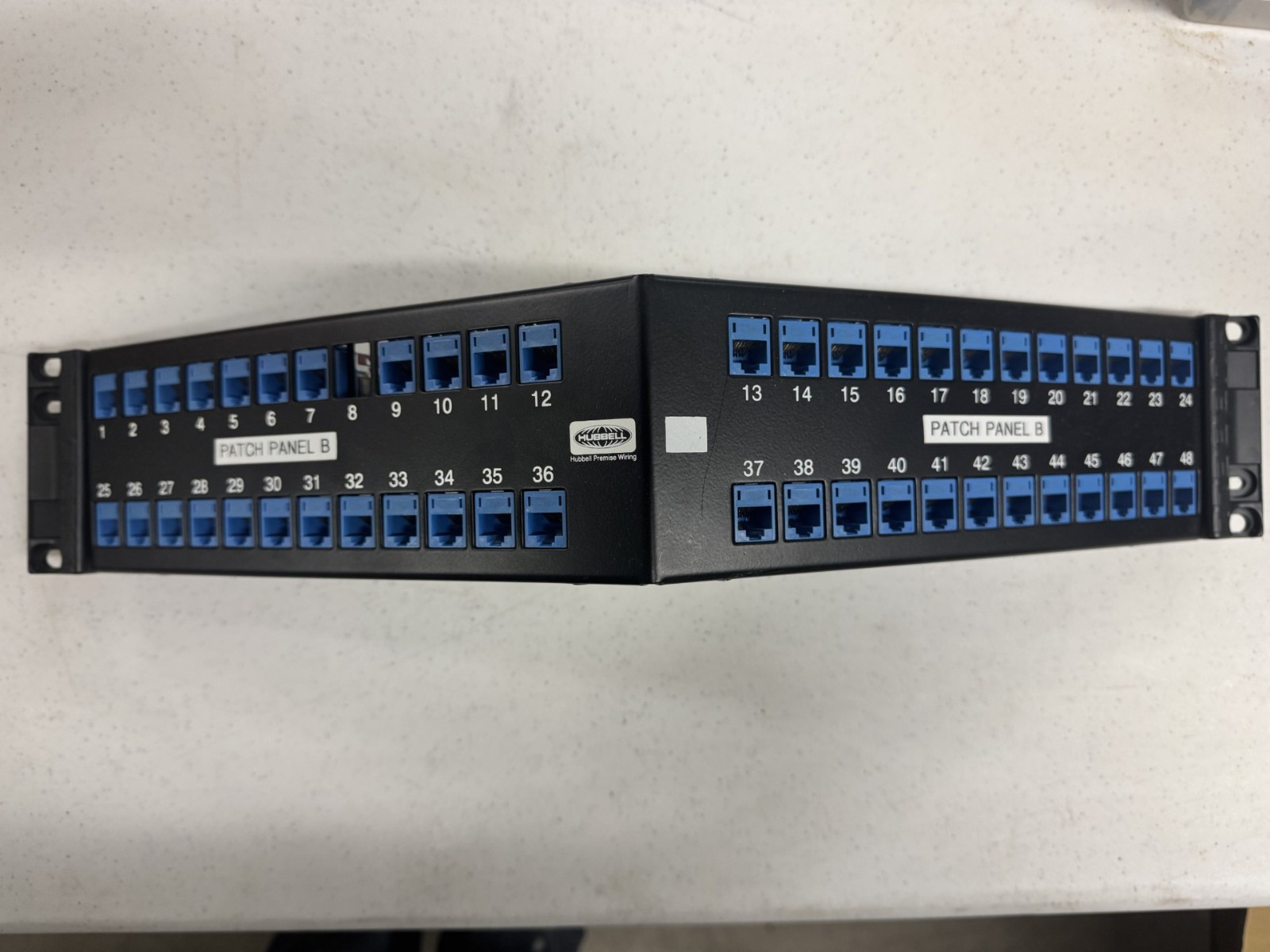 USED HUBBELL UDXA48 48 PORT ANGLED PATCH PANEL LOADED WITH CAT 5e JACKS!