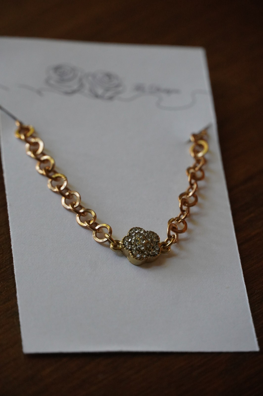 Gold Tone Chain 6.5" Bracelet with a Rhinestone Flower