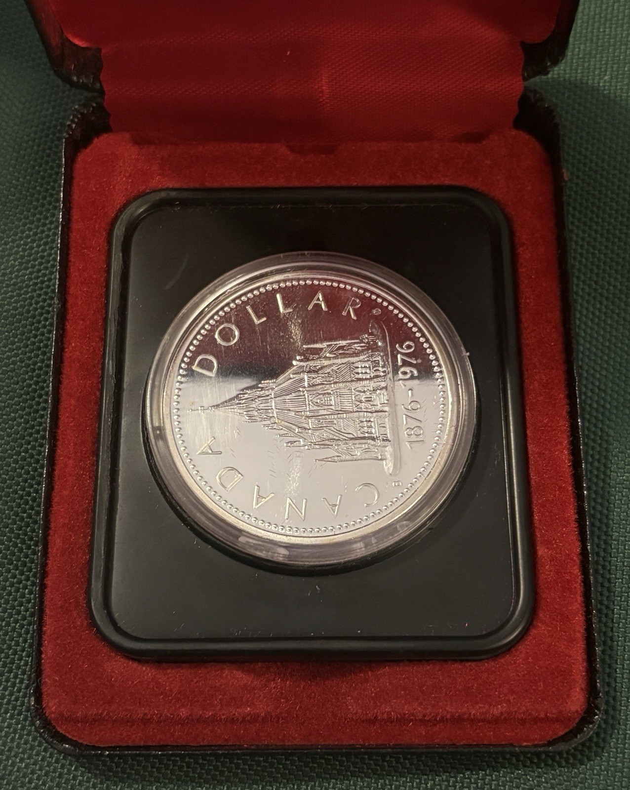 1976 Canadian Silver Dollar Parliamentary Library Coin OGP  .5 / 50% silver 32a