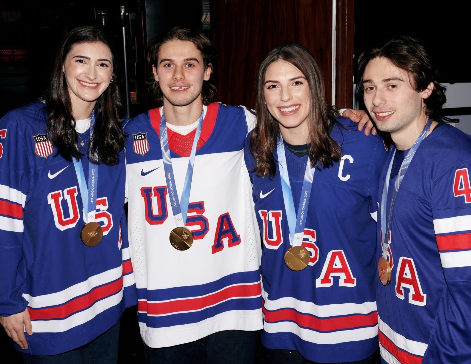 Jack & Quinn Hughes, Hilary Knight & Megan 2026 Olympics Gold 8.5x11 NHL Photo