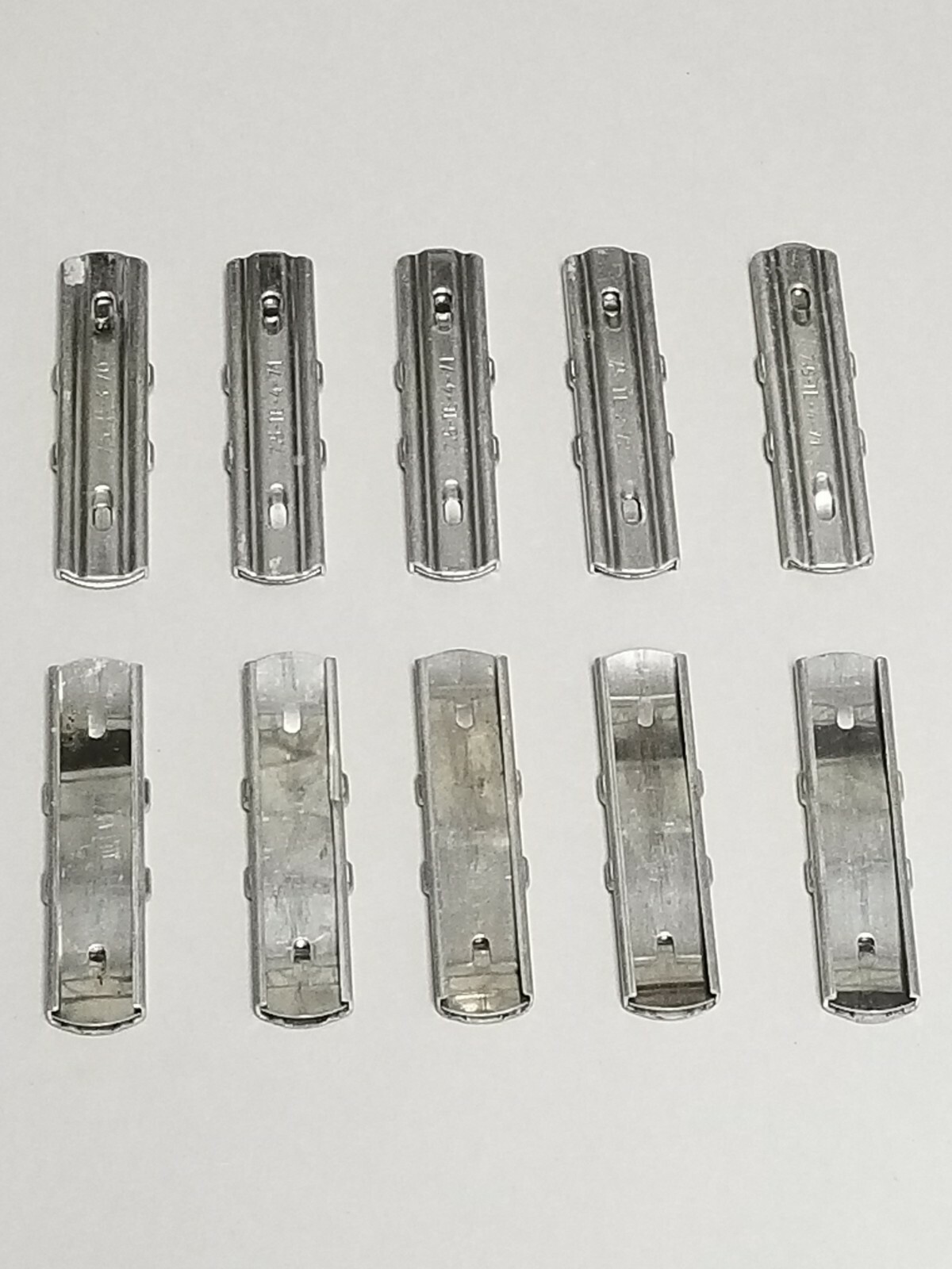 SET OF 10 MAS 36 STRIPPER CLIPS.