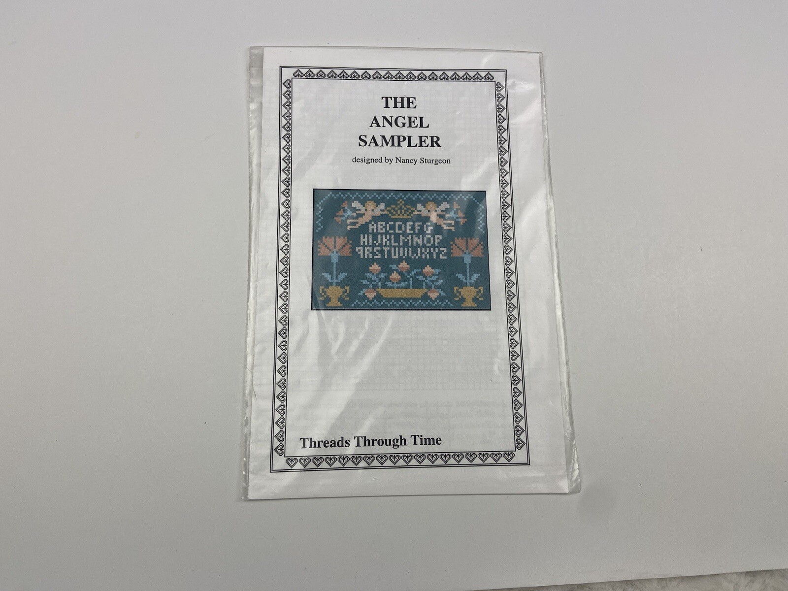 Threads Through TIme The Angel Sampler Counted Cross Stitch Pattern