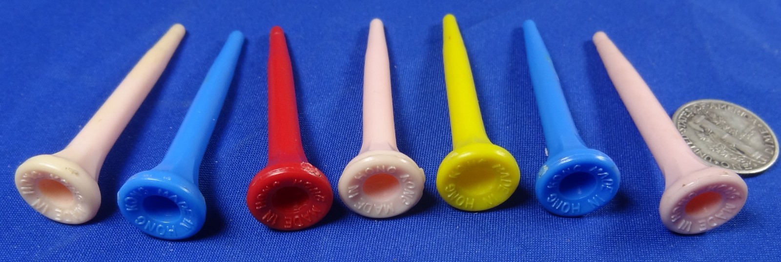 7 ANTIQUE VINTAGE  ADVERTISING GOLF TEES MADE IN HONG KONG VERY COLLECTABLE