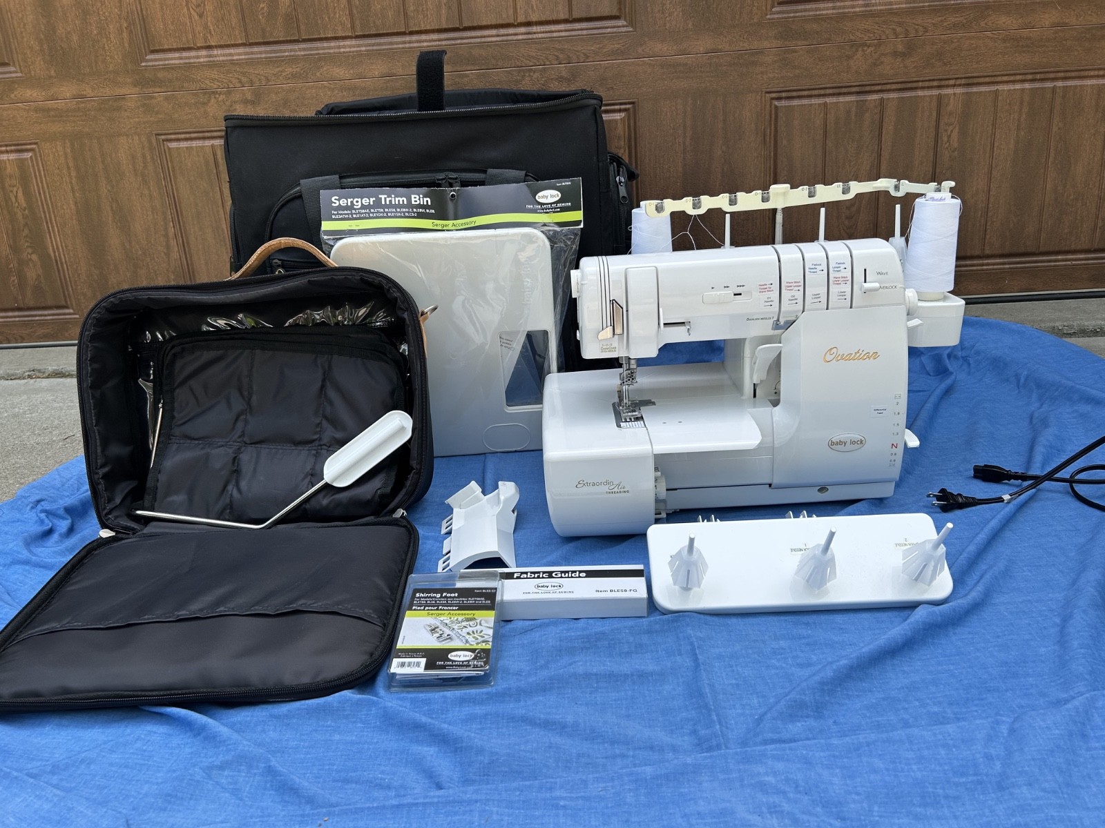 Babylock Ovation serger with roller case, accessory case, 20 feet, and more