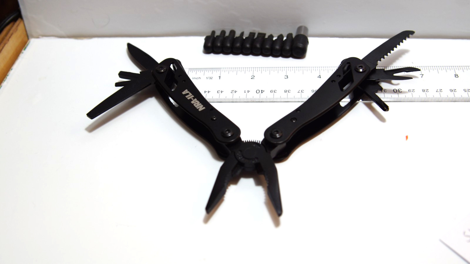 NRA‑LIA Black Multi‑Tool w/ Bits & Nylon Sheath – Knife Saw Pliers Set