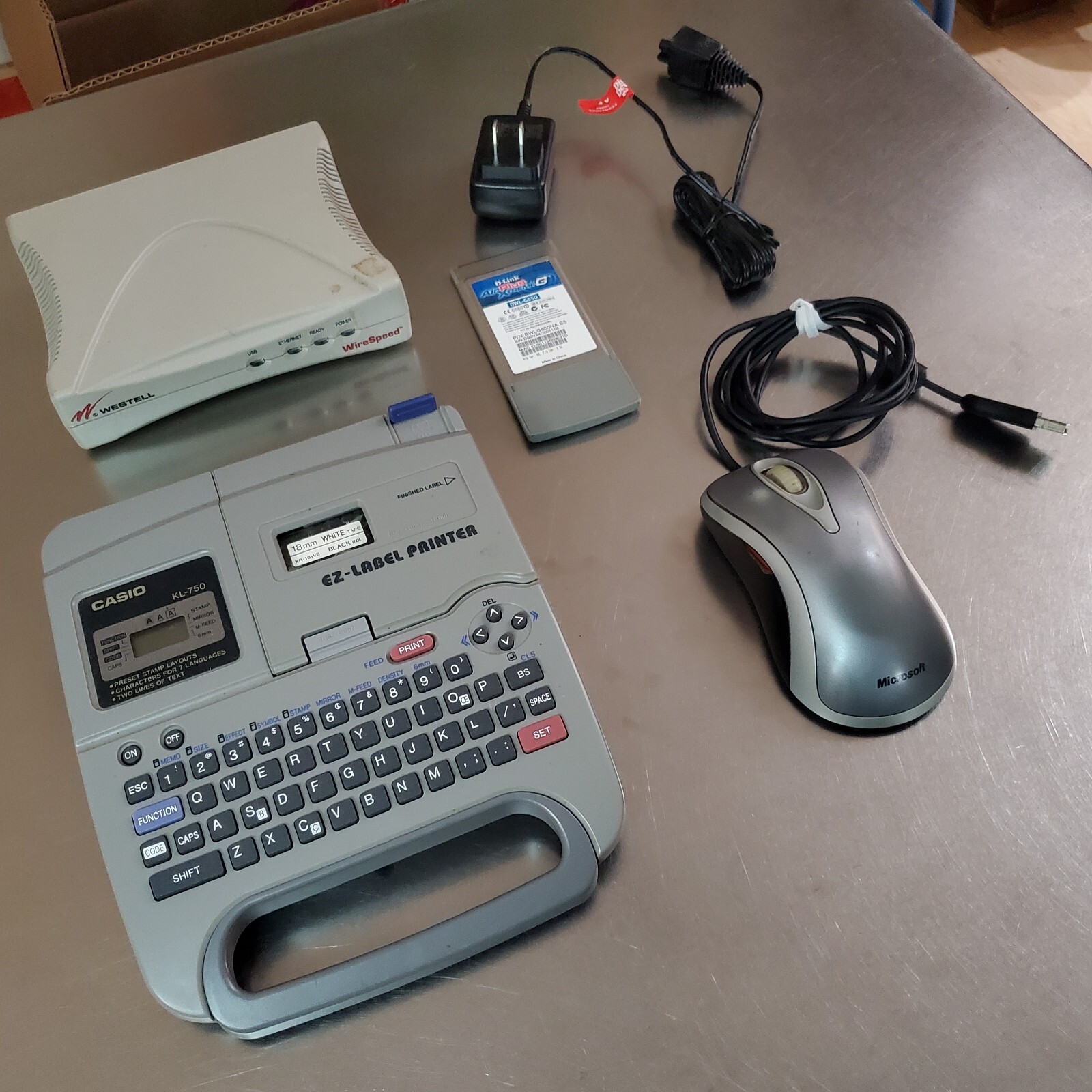Lot of 5 Electronics Items: Casio, Microsoft, D-Link, Westell, Dirt Devil