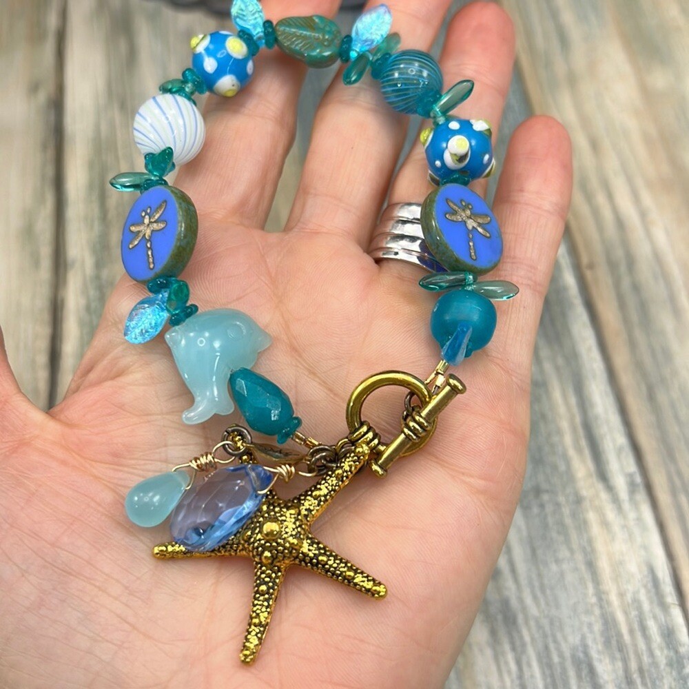 Adorned Crown Assemblage beaches & butterflies dragonfly starfish bracelet