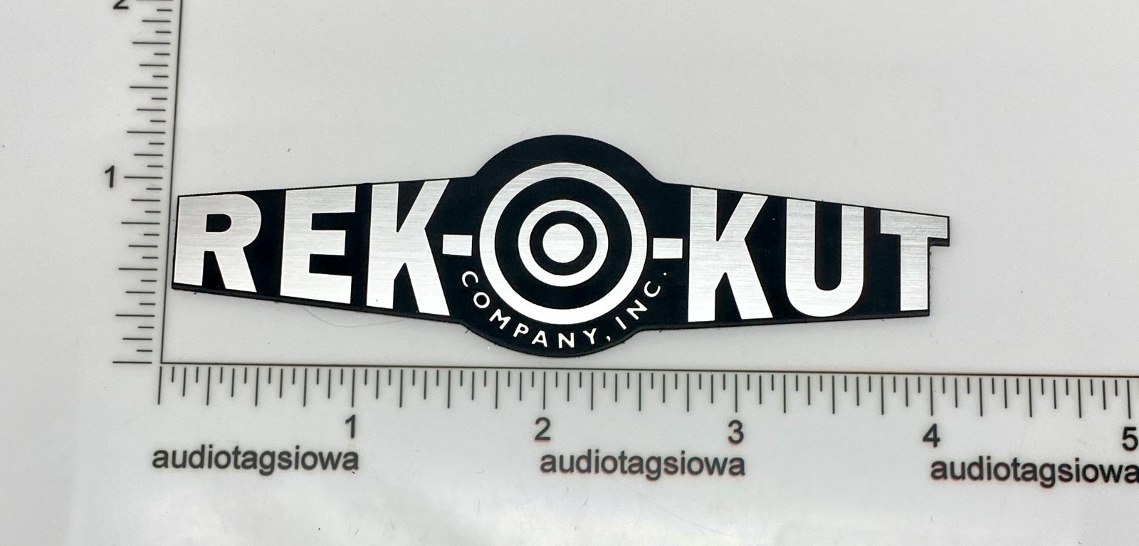 Rekokut  Logo  Badge Custom Incised Acrylic Self Stick  Rek-o-kut