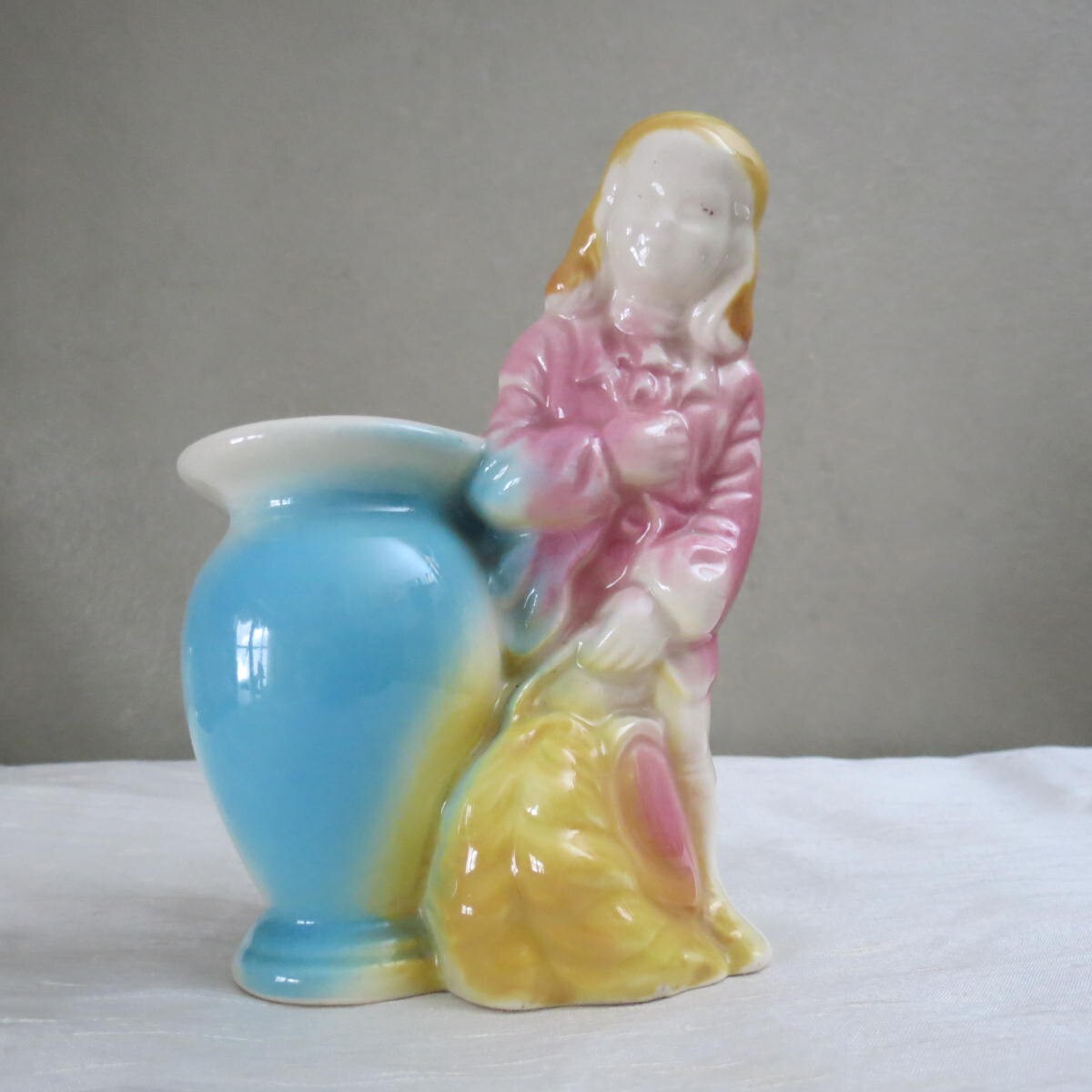 Plume hatted gentleman vintage planter bowing
