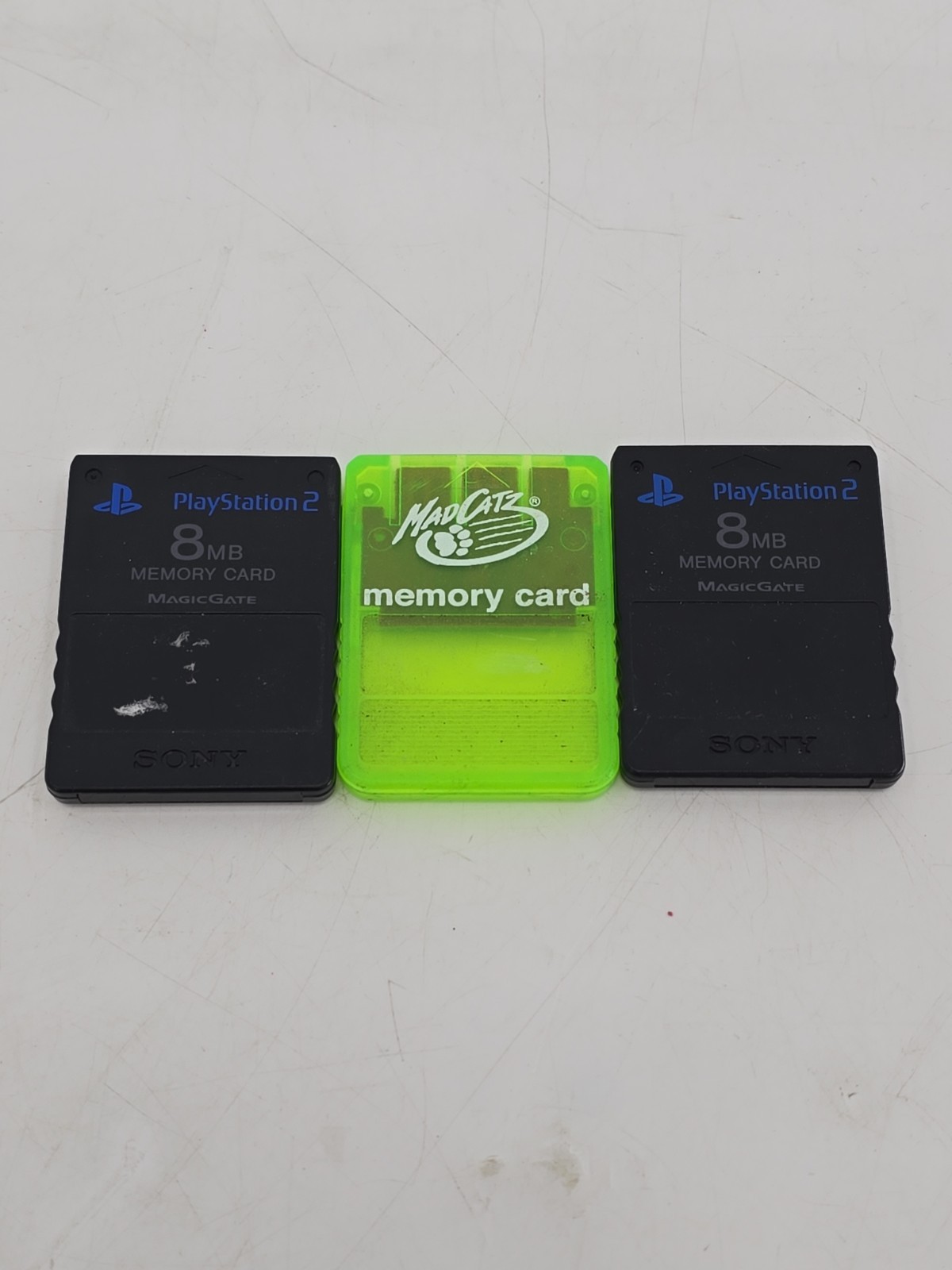 2 Official Sony PlayStation 2 8MB Memory Card - Black & 1 Green Mad Catz