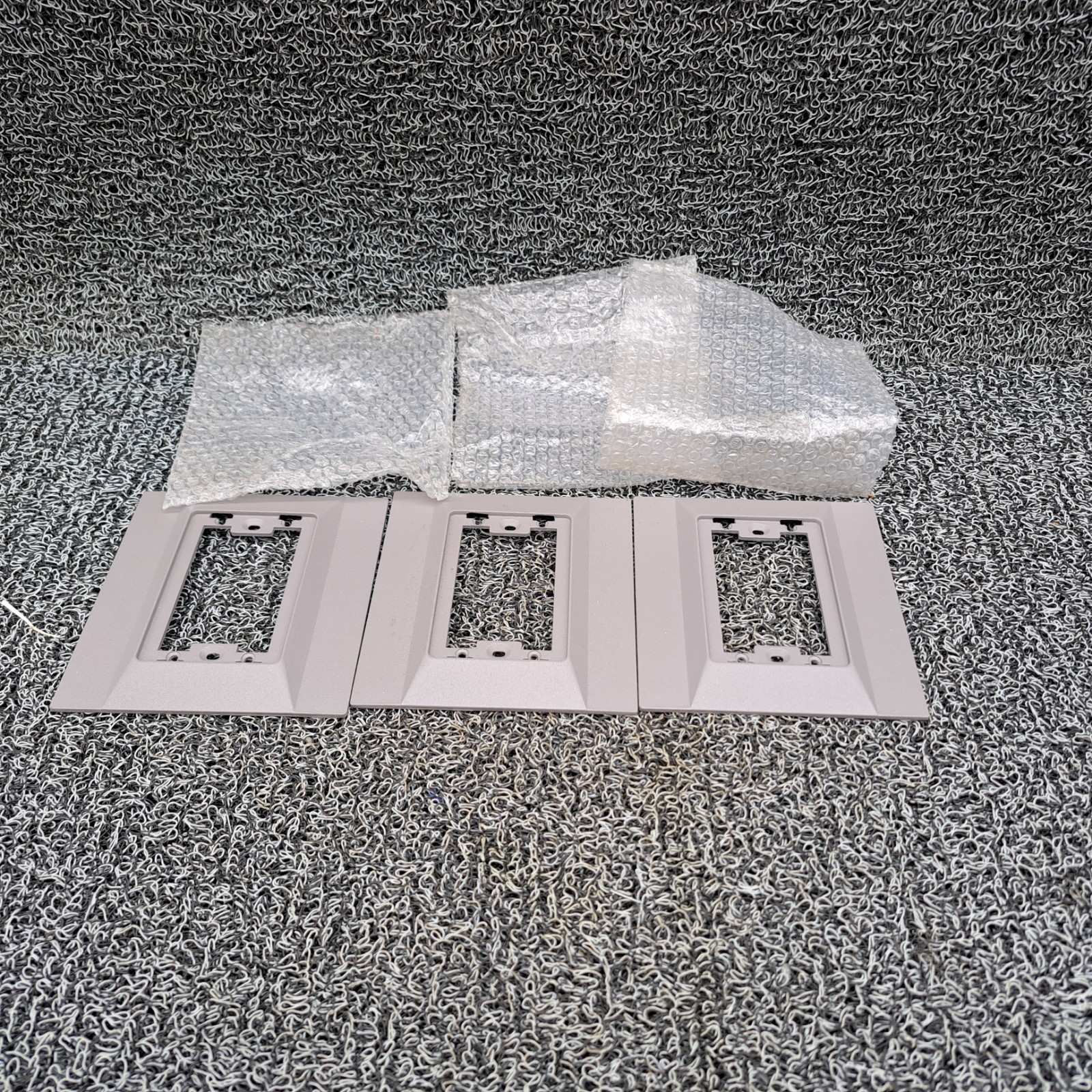 Matt grey cast metal outlet outer trim, wall plates. lot of 3