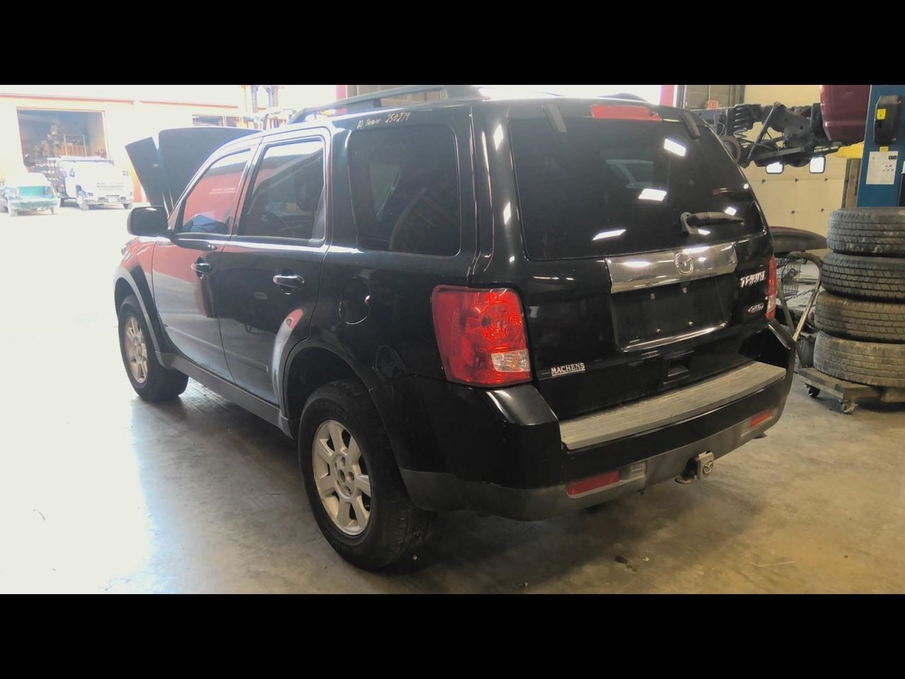 TRIBUTE 2010 Spare Wheel Carrier 716511