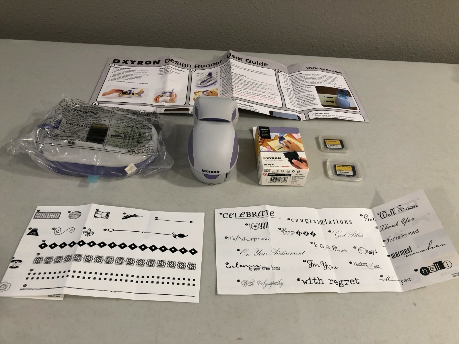 Xyron 24139 Design Runner Handheld Cordless Printer NEW NO BOX - 1 Ink &2 Discs