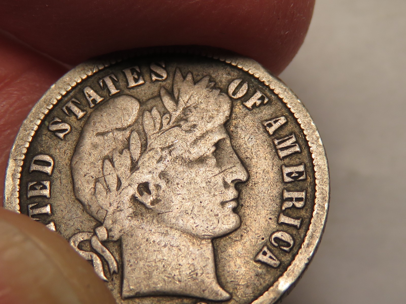 1899-O Barber Dime, Fine, Small Rim Ding